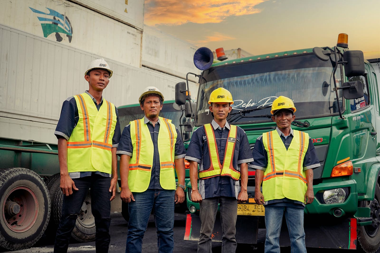 SMP team standing in front of truck